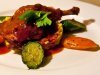 Duck served on a bed of rice 