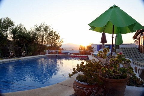 Sunset 

over the swimming pool