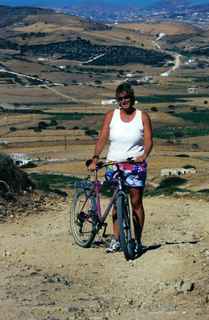 Jan with bike on hilly Antiparos