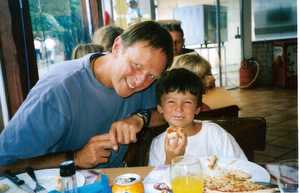 Grandad and Harry eating pizza in Leon