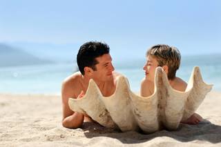 Naturist couple on a shell