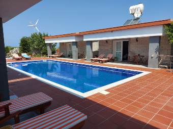 Serenity swimming pool overlooked by the bungalows.